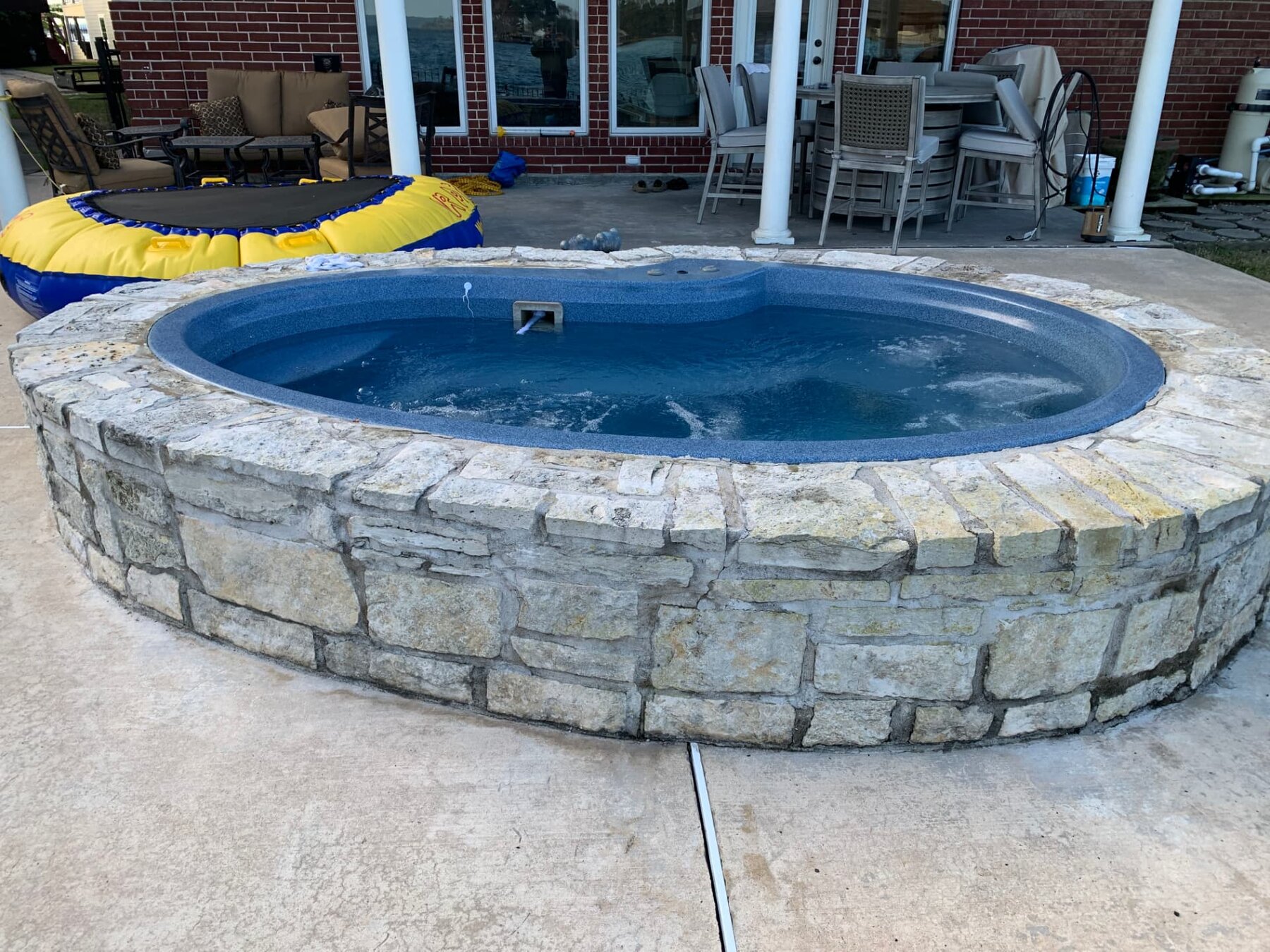 Custom stone surround, filled and running
